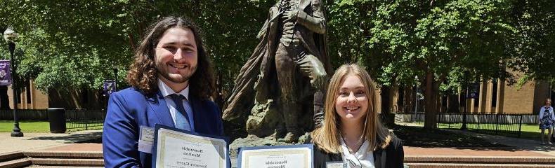 Two students hold awards received at the East 德州 Regional Phi Alpha Theta Conference 2024